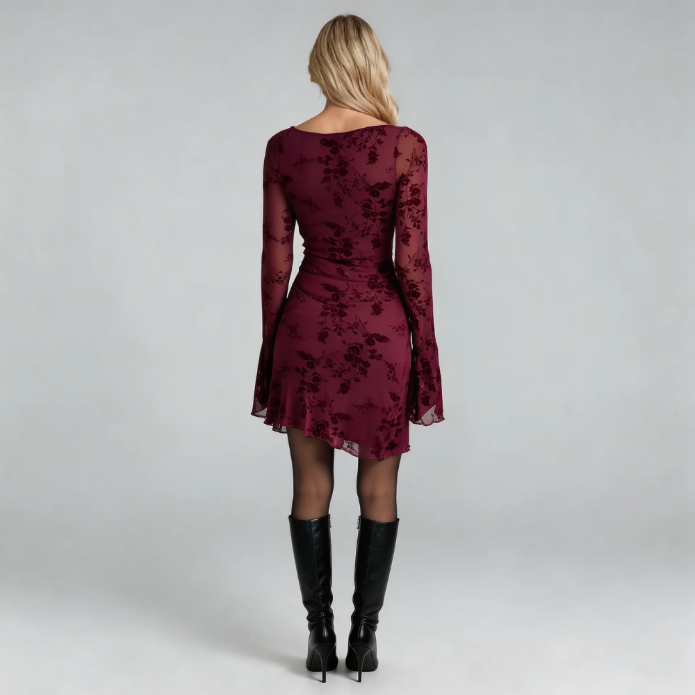 Wine floral mesh mini dress with lettuce hem and floral mesh fabric — back view highlighting design details and flowing fit.