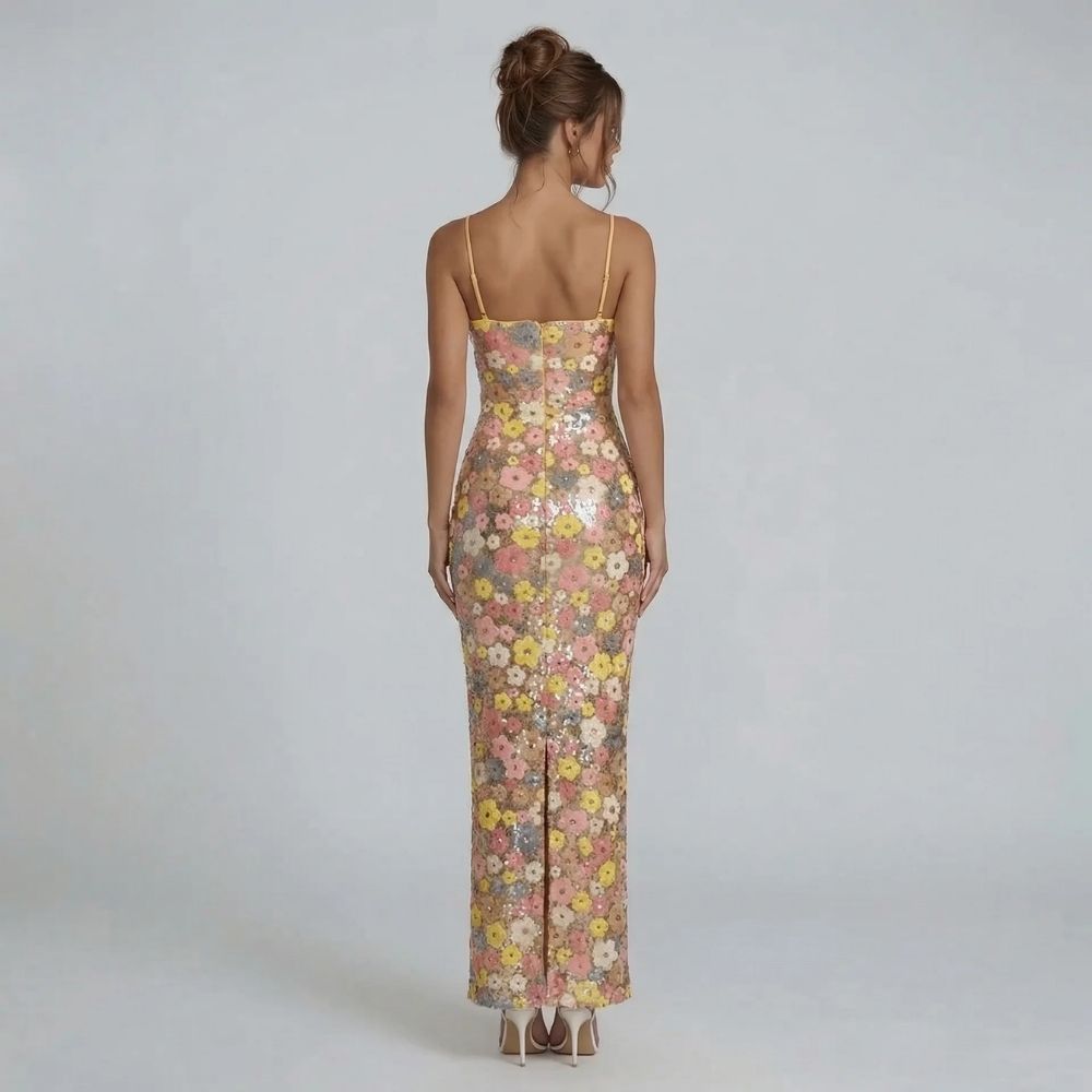 Tan floral sequin maxi dress — back view highlighting zip closure and slit for movement.