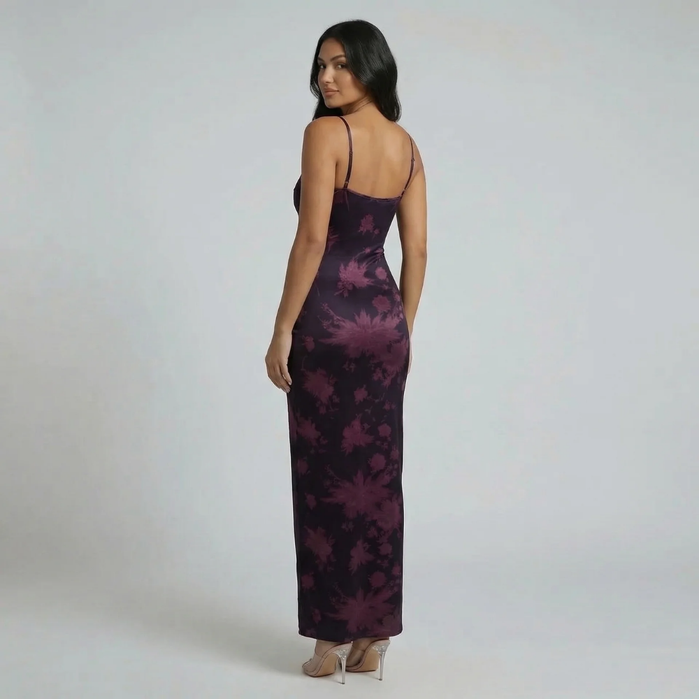 Purple floral maxi dress with corset-style back and adjustable straps — rear view.
