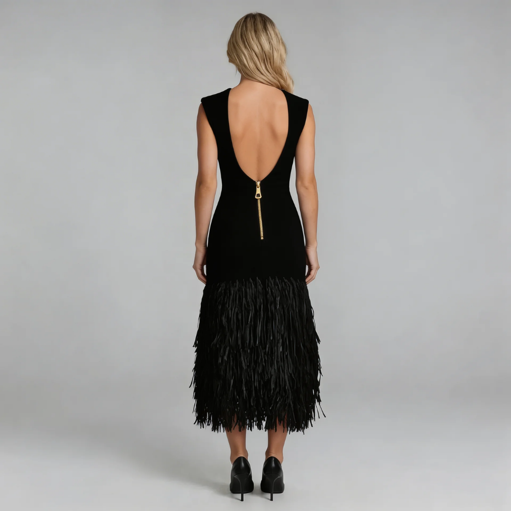 Black fringe midi dress showcasing open V-back with zipper detail.