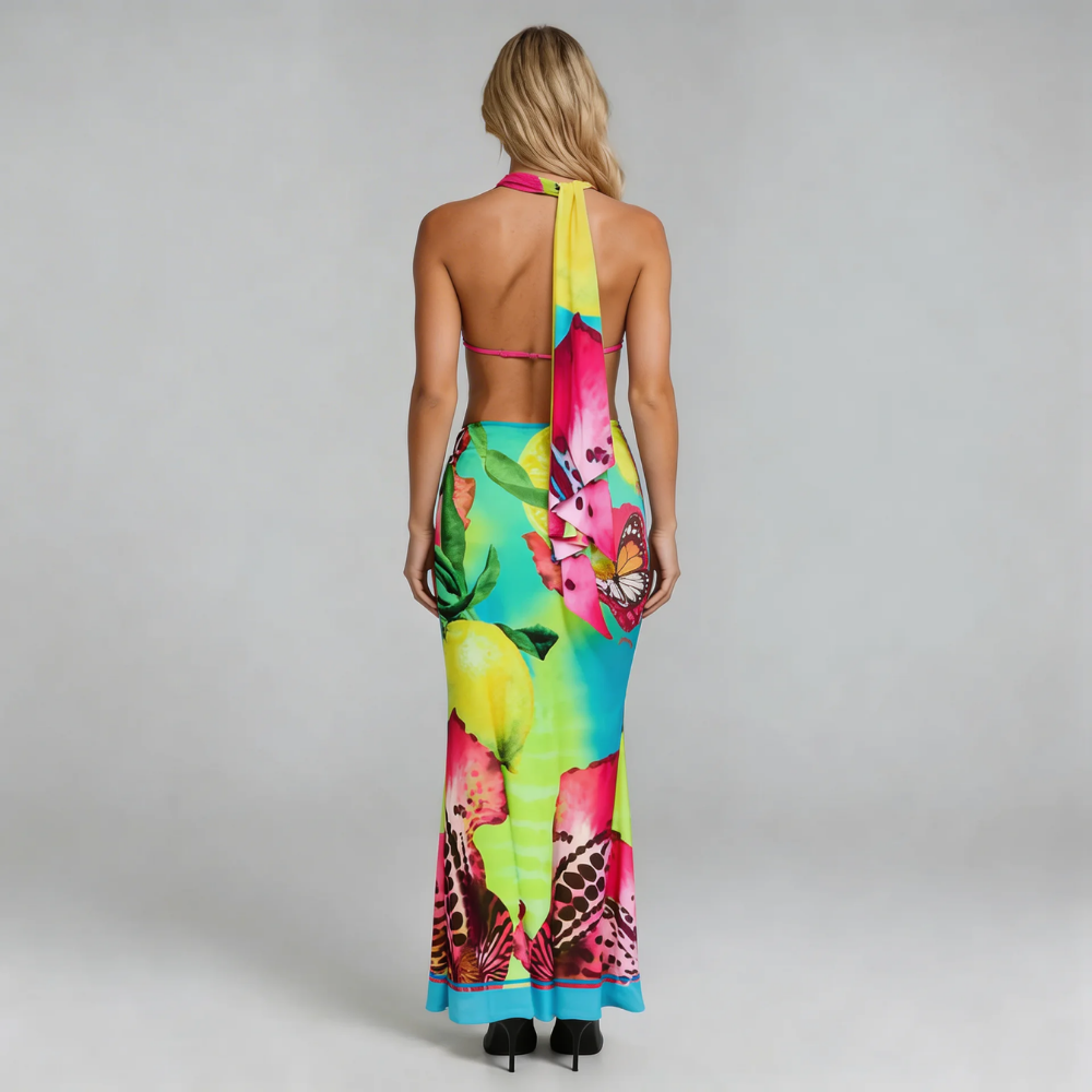 Multicolor tropical halter top and high-slit maxi skirt — back view showing open tie detailing.