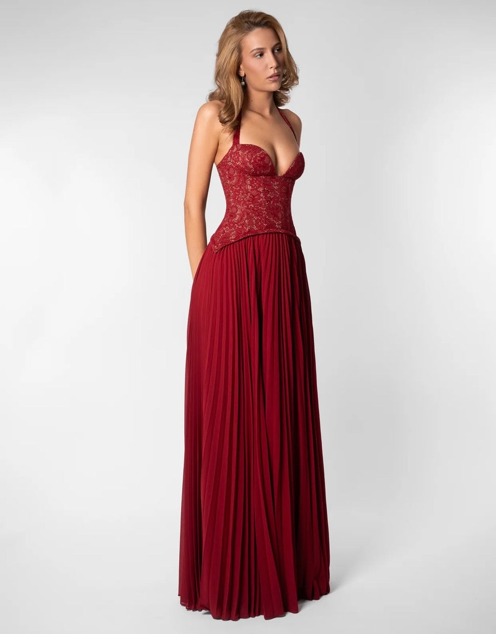 Women burgundy lace corset maxi dress with sweetheart halter neckline and pleated floor length skirt