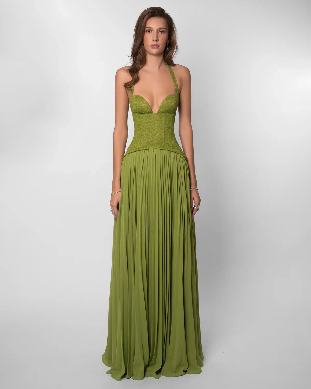 Women green lace corset maxi dress with sweetheart halter neckline and pleated floor length skirt