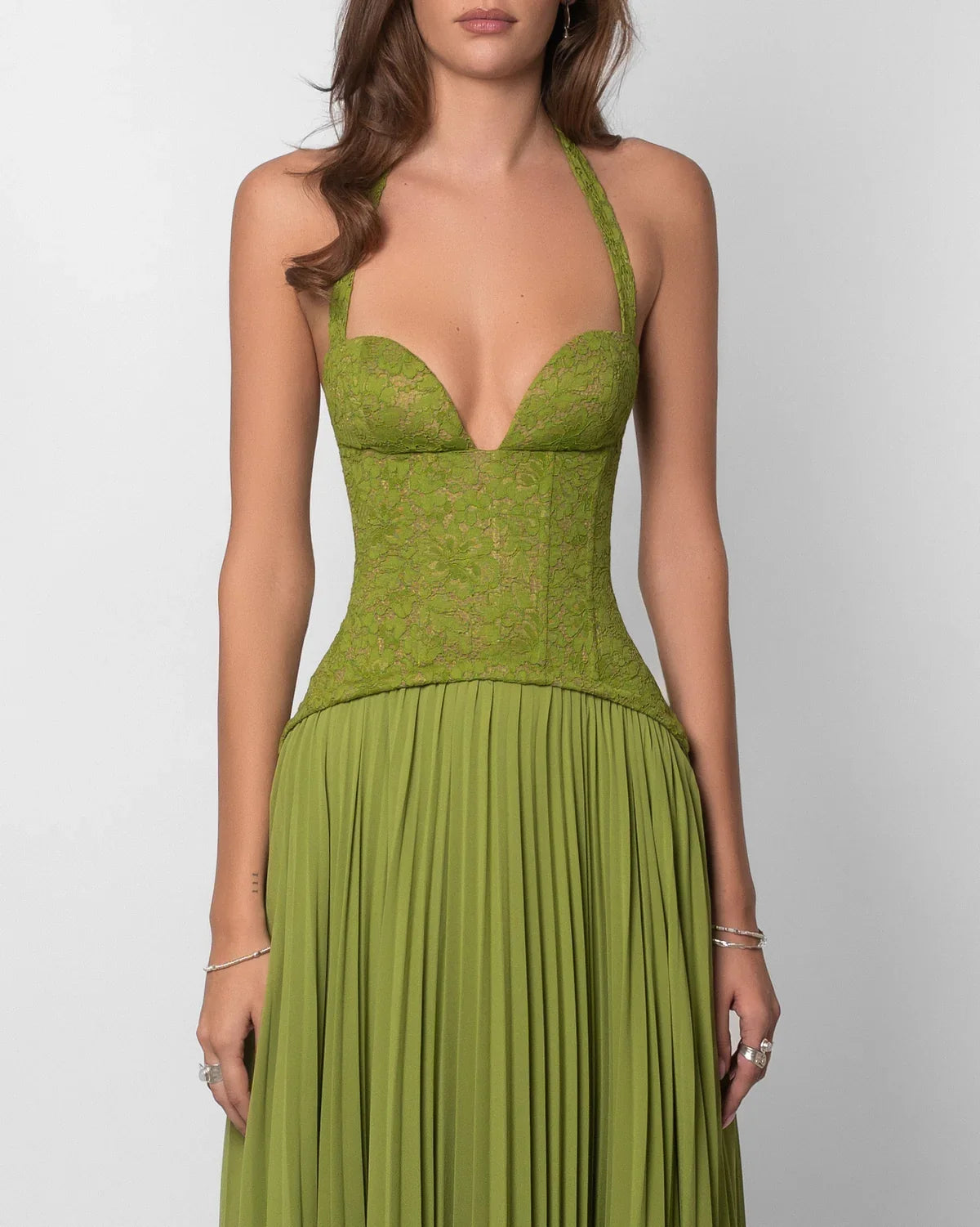 Women green lace corset maxi dress with sweetheart halter neckline and pleated floor length skirt