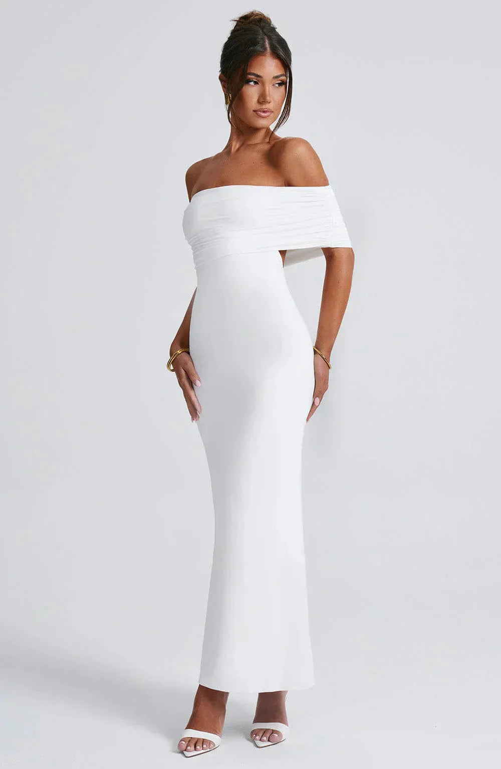 Women white off shoulder maxi dress, side view