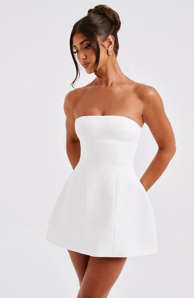 Women white strapless mini dress, side view