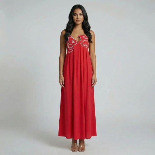 Red graphic maxi dress with sweetheart neckline and spaghetti straps, front view.