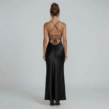 Black lace-up maxi dress — back view capturing the striking lace-up open back and adjustable ties.