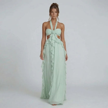 Mint chiffon maxi dress — front view with halter straps and sweeping ruffles.