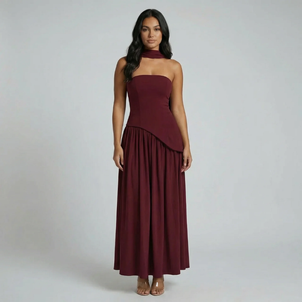 Burgundy strapless maxi dress with asymmetrical overlay and side slit — styled look