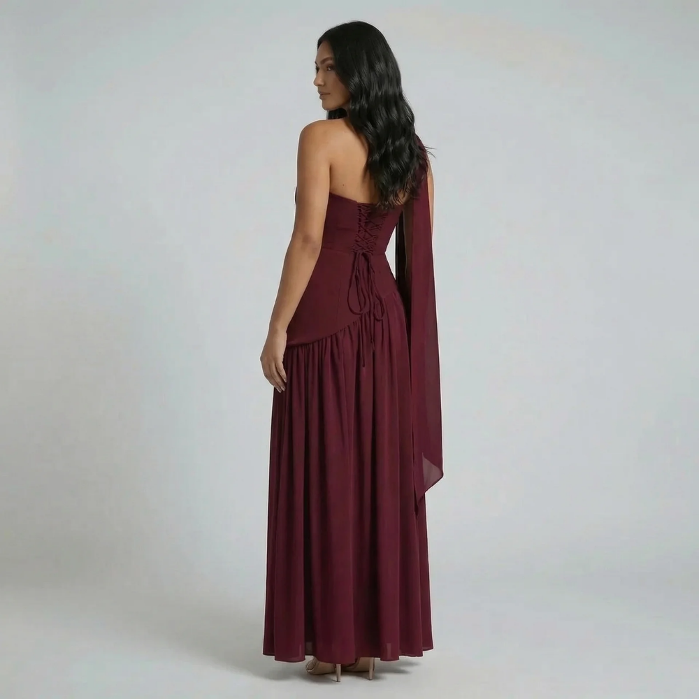 Burgundy strapless maxi dress with lace-up back and neck scarf — back view