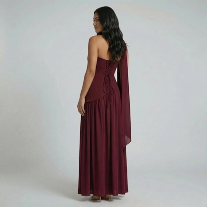 Burgundy strapless maxi dress with lace-up back and neck scarf — back view