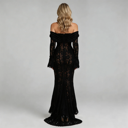 Black lace off-shoulder maxi dress with flared cuffs — back view highlighting a sweeping train and elegant fit.