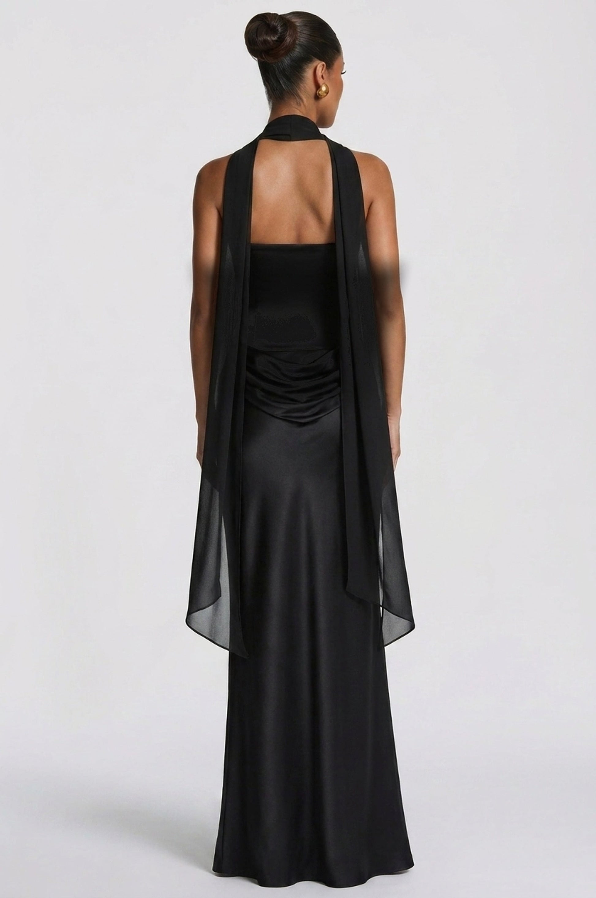 Women black cowl strapless maxi dress, side view