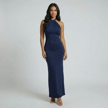 Navy halter ruched maxi dress — front view showcasing ruched waist detail.