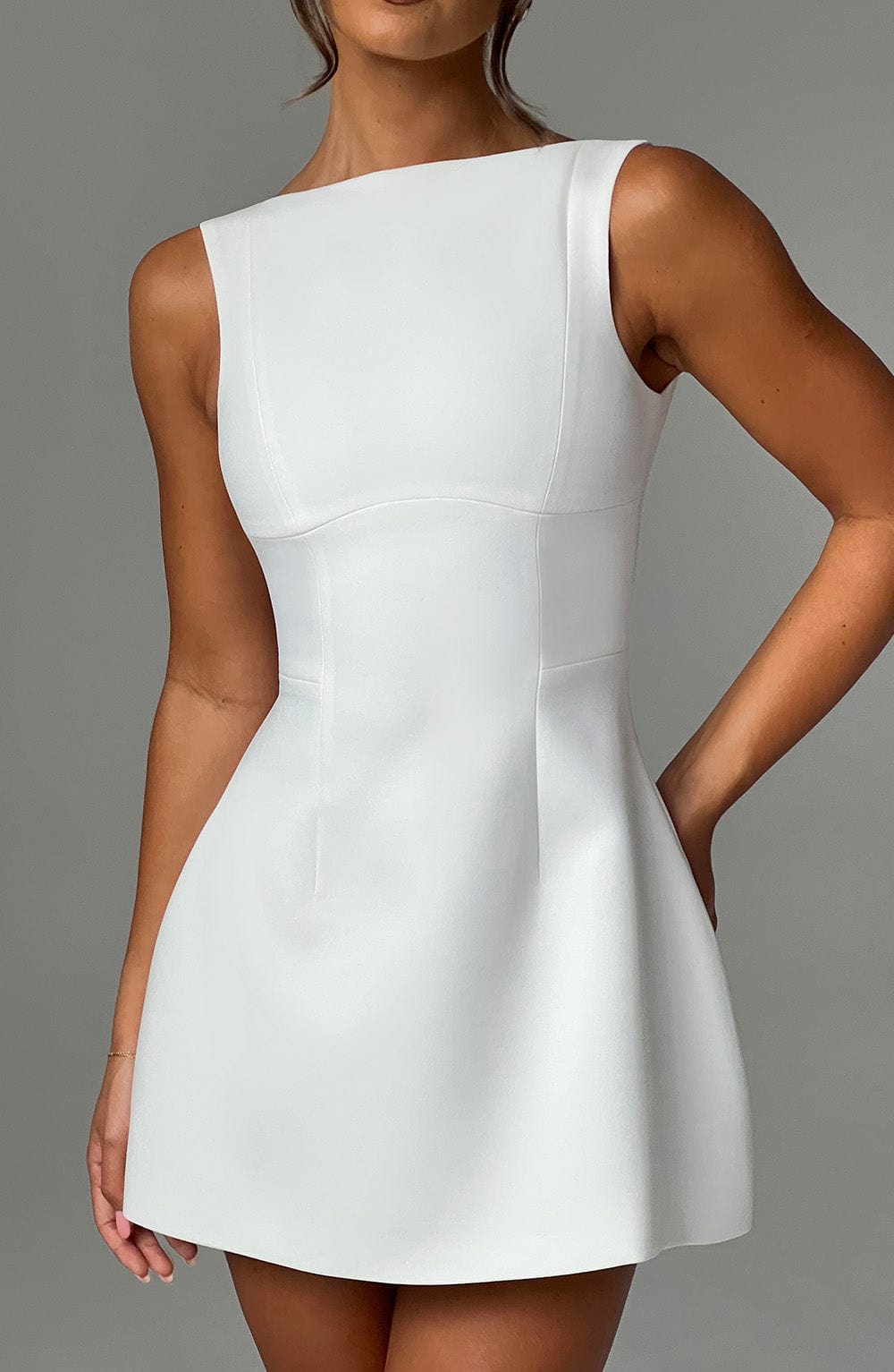 Women ivory scoop mini dress, side view