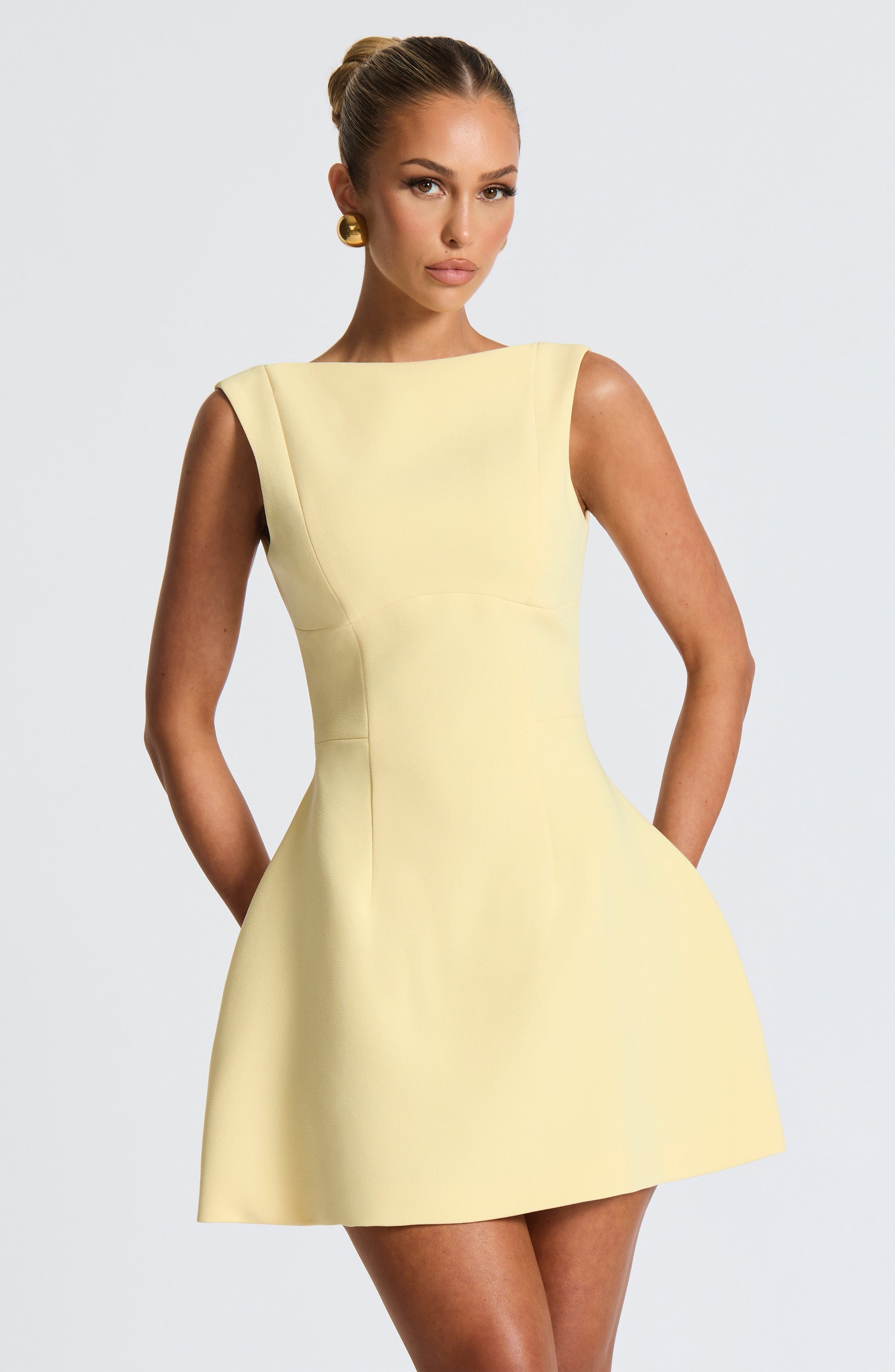 Women scoop mini dress, side view