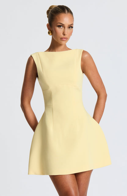 Women scoop mini dress, side view