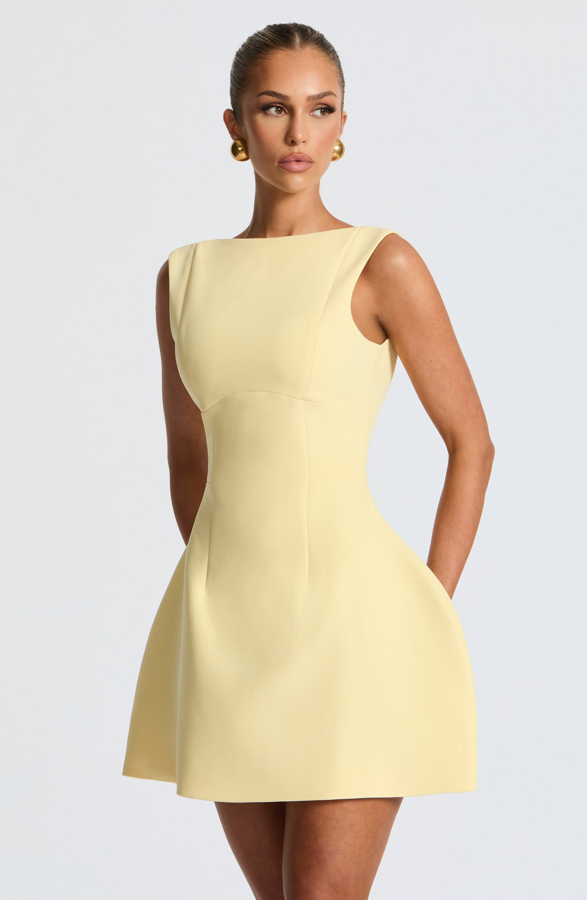 Women scoop mini dress, back view