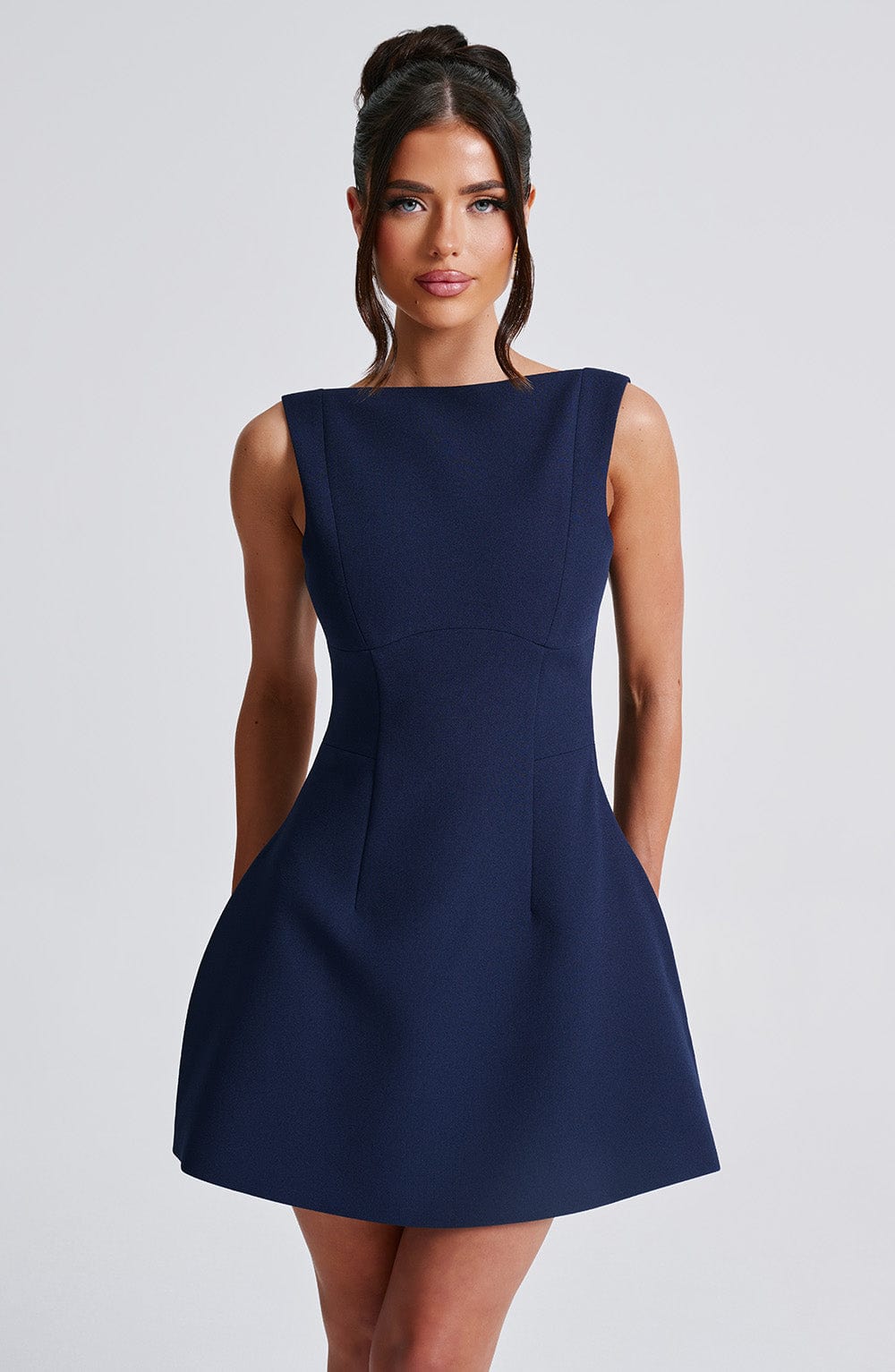 Women navy scoop mini dress, back view