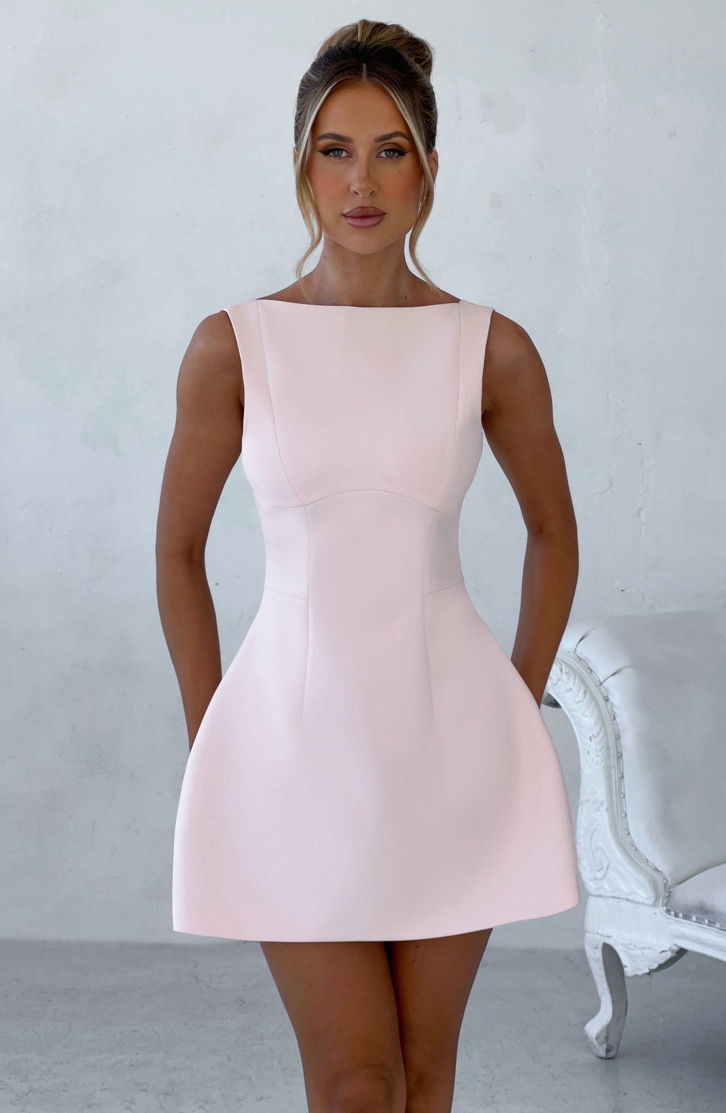 Women scoop mini dress, side view