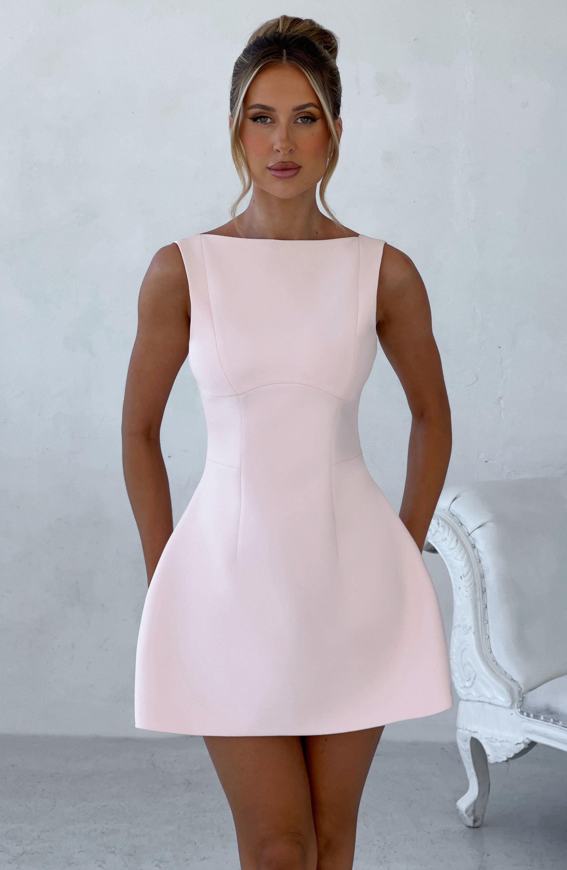 Women scoop mini dress, side view
