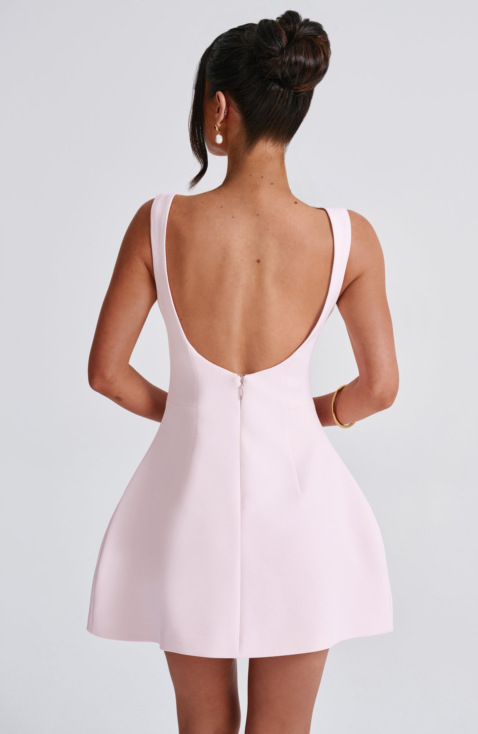 Women scoop mini dress, side view