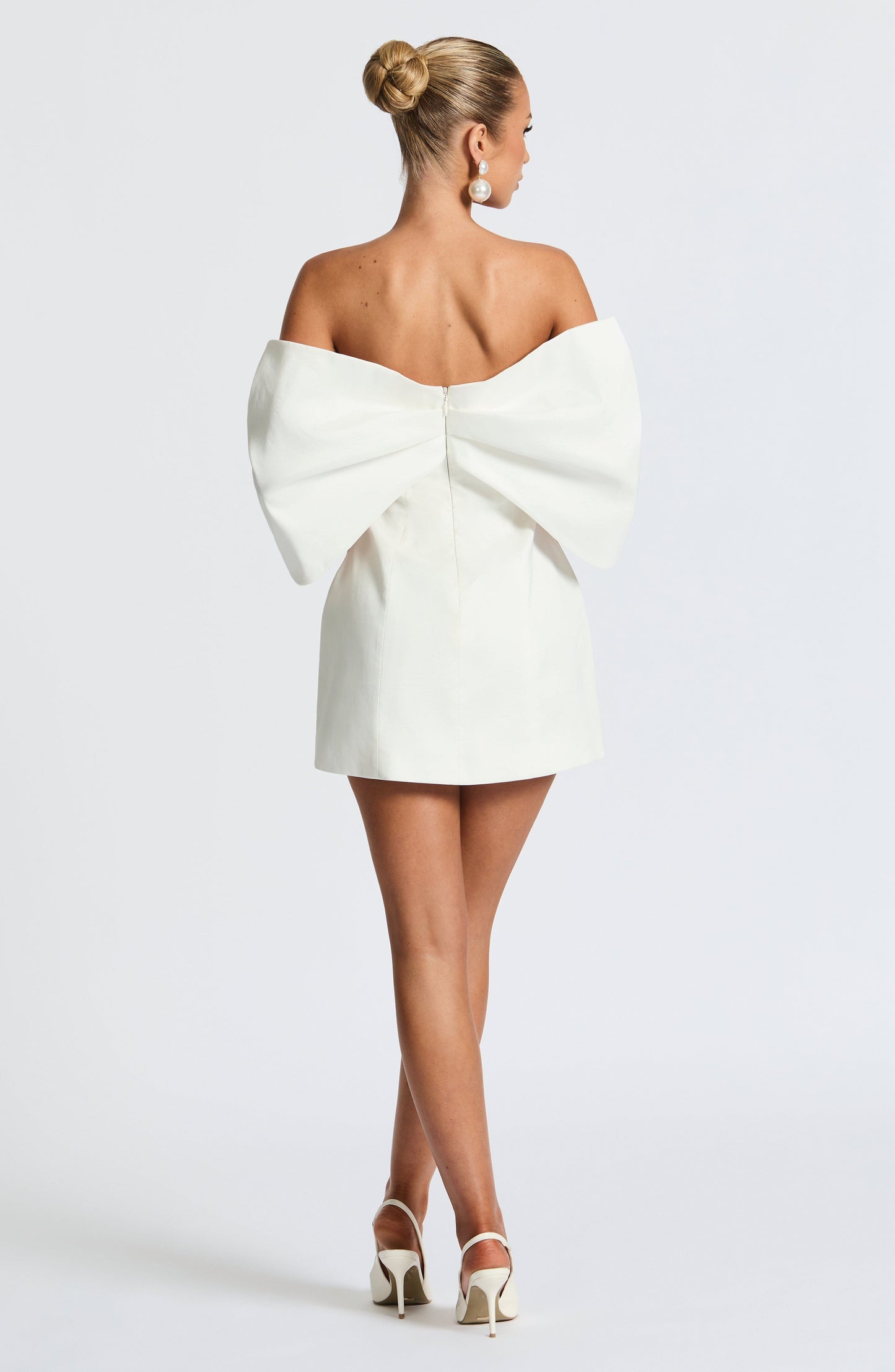 Women ivory bardot mini dress, side view