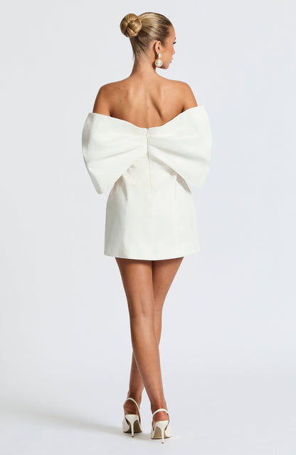 Women ivory bardot mini dress, side view