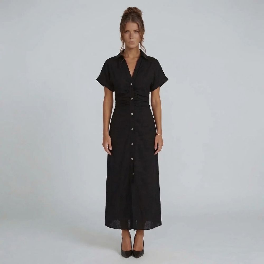 Black button-down midi dress showing ruched waist detail and collared neckline, front perspective.