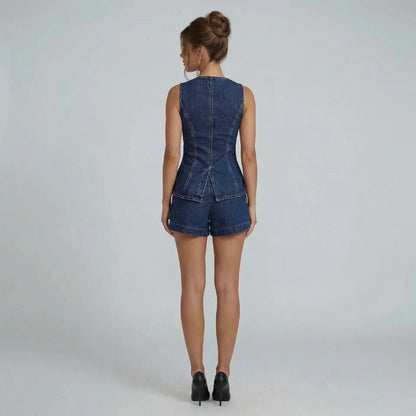 Navy denim two-piece set back view showing contoured seaming and relaxed wide-leg shorts.
