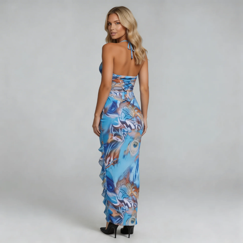 Blue feather-print maxi dress with corset-style back — close-up of back detail and tie closure.