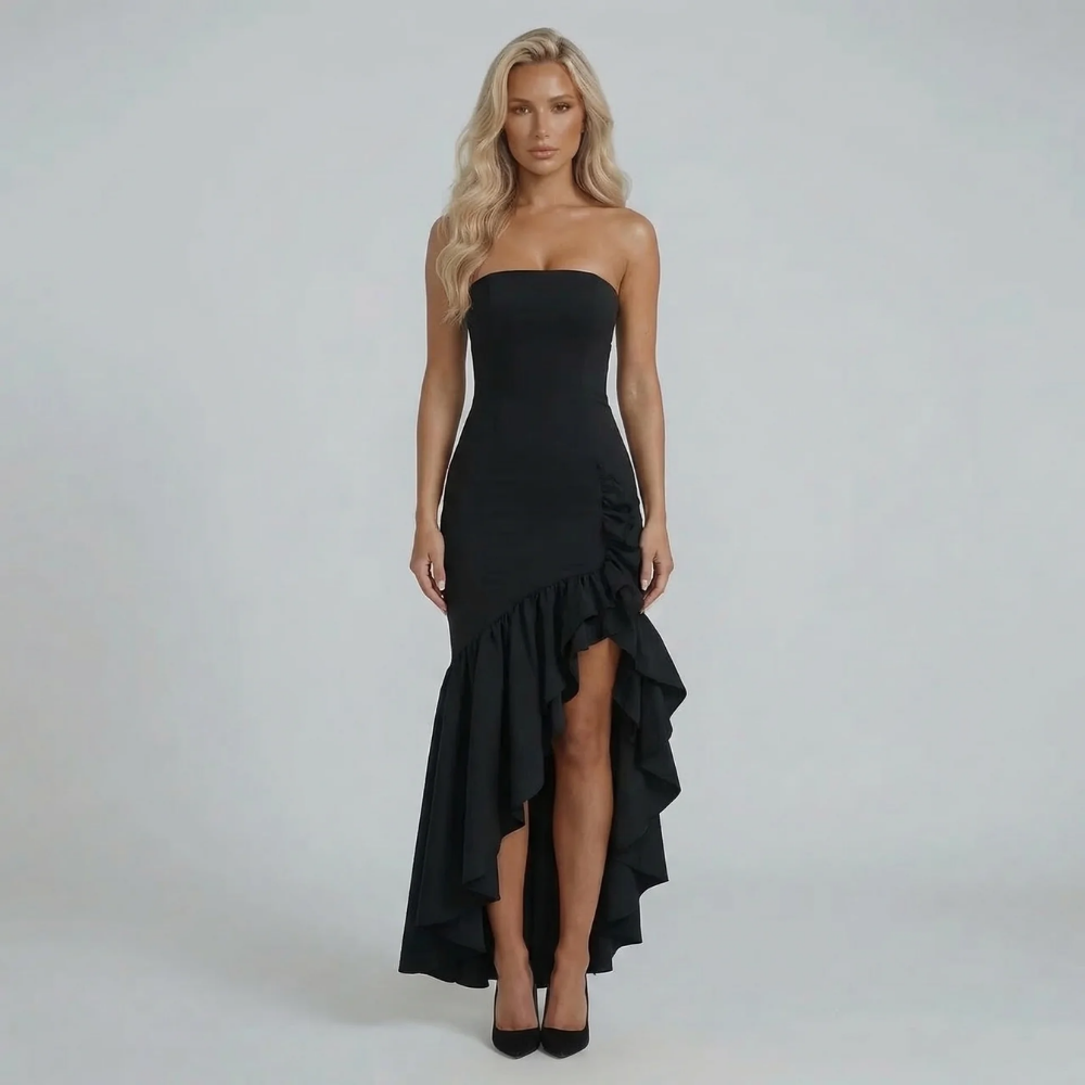 Black strapless ruffle maxi dress — front view with dramatic ruffle and bold slit design.
