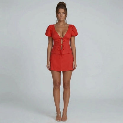 Red puff sleeve top with A-line mini skirt set — full front view.