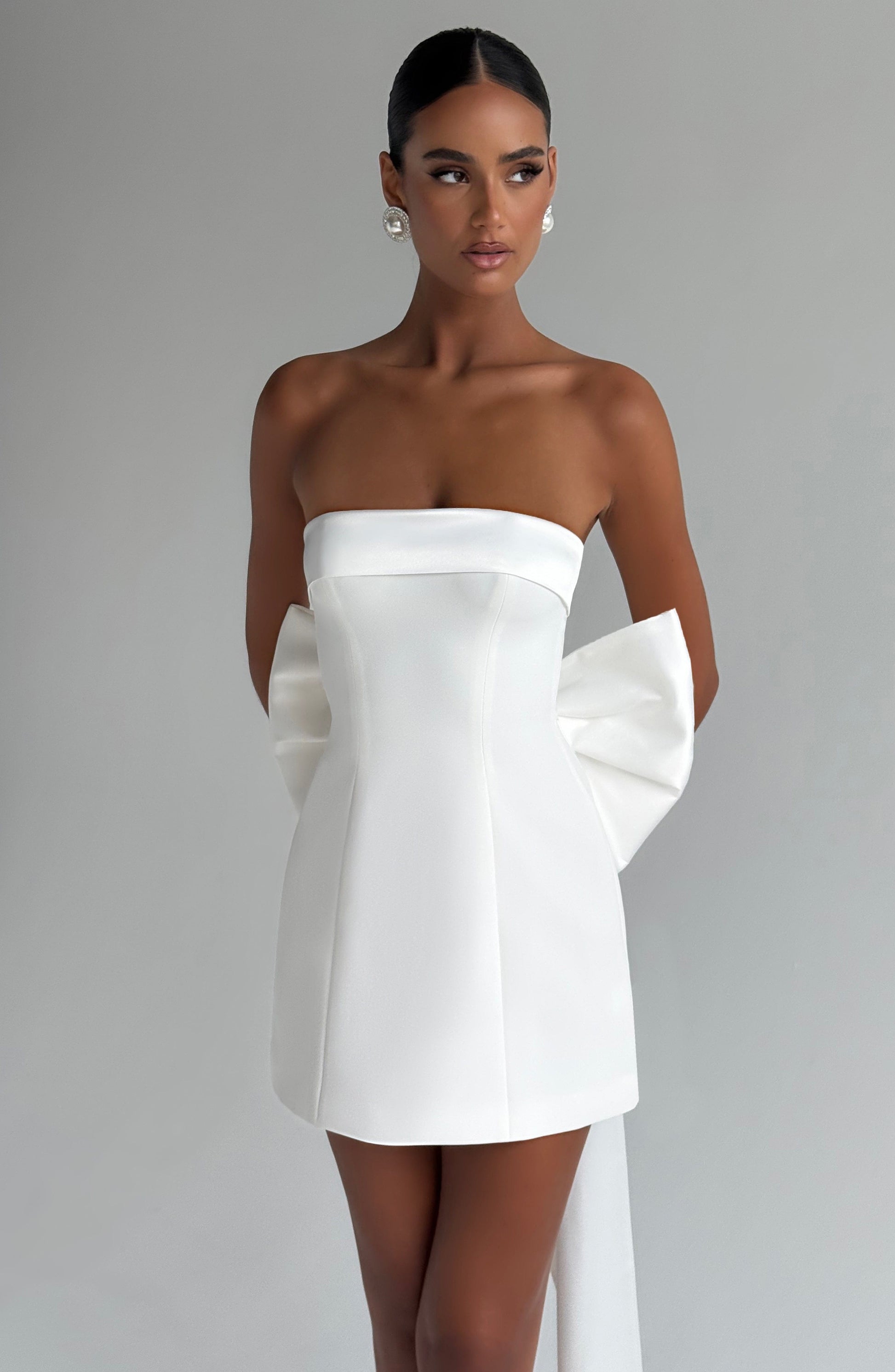 Women strapless mini dress, side view