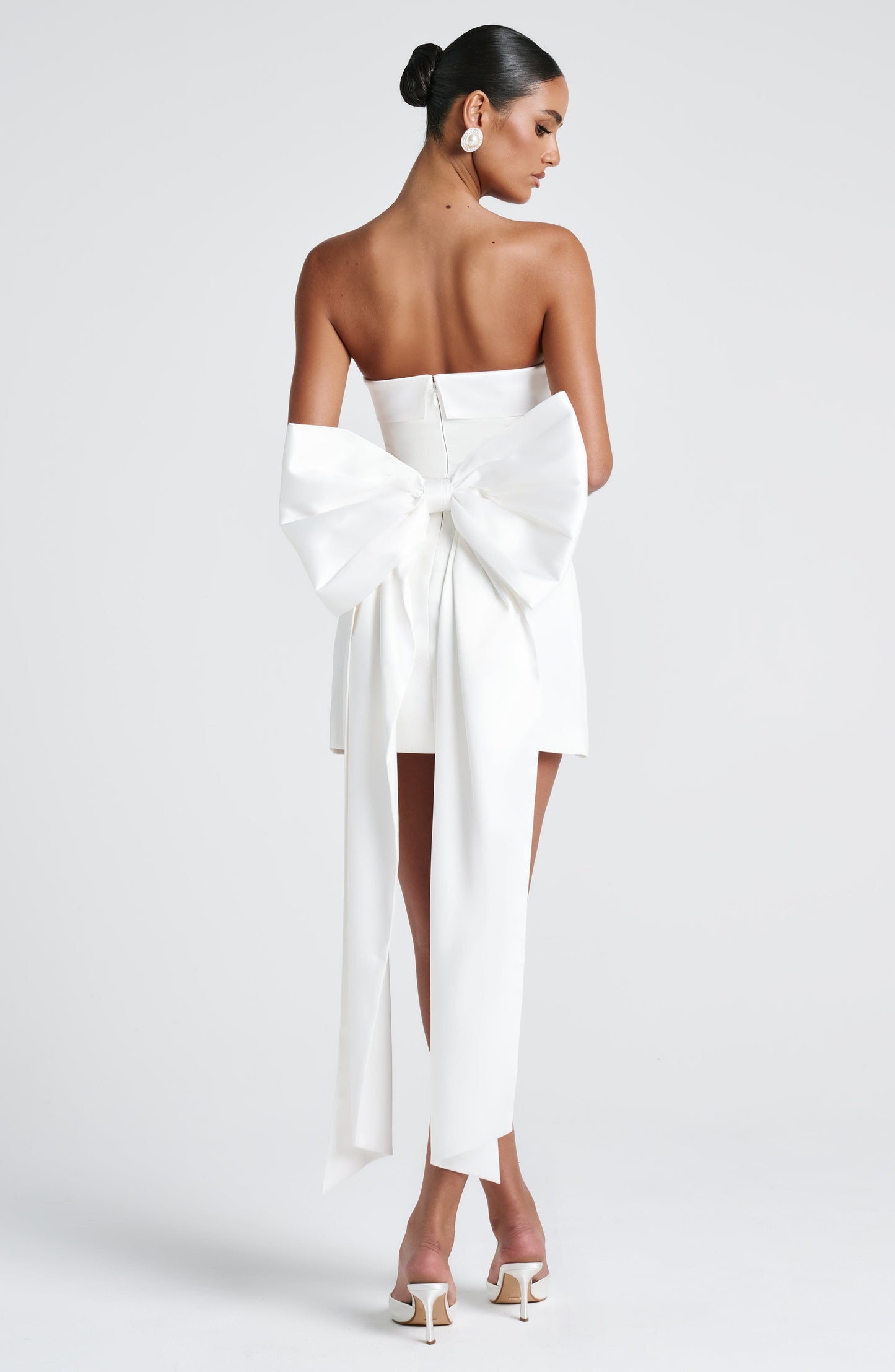 Women strapless mini dress, side view