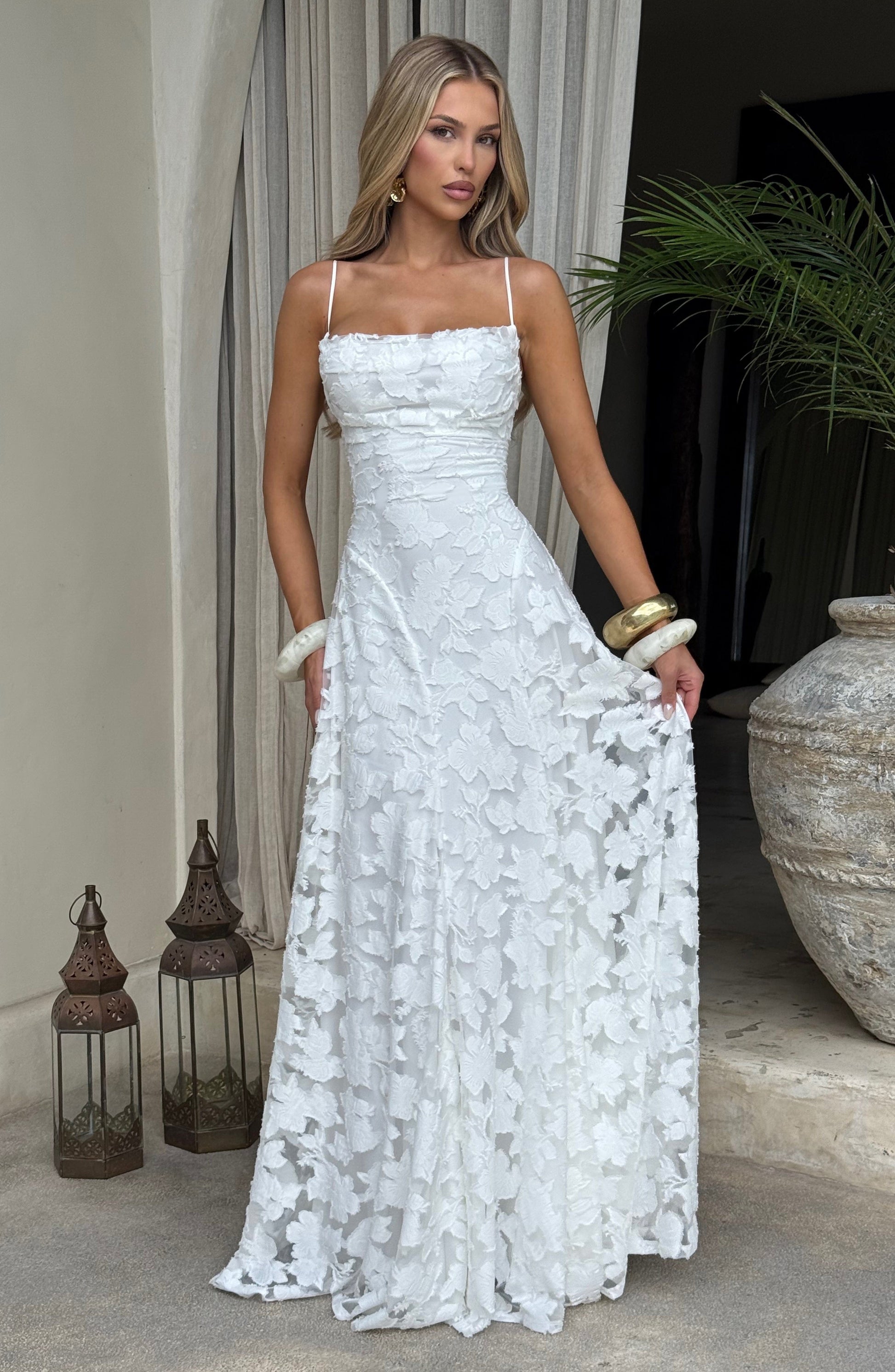 Women ivory cowl maxi dress, side view
