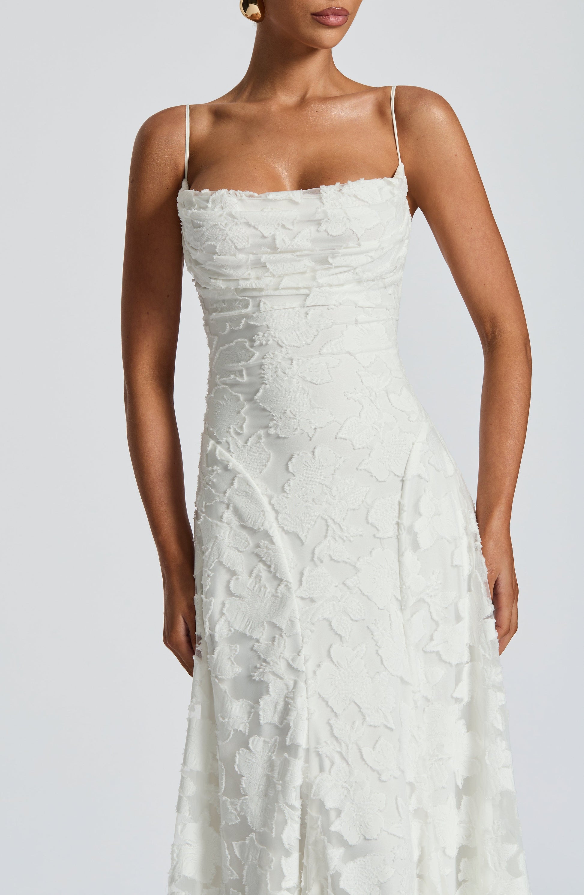 Women ivory cowl maxi dress, side view