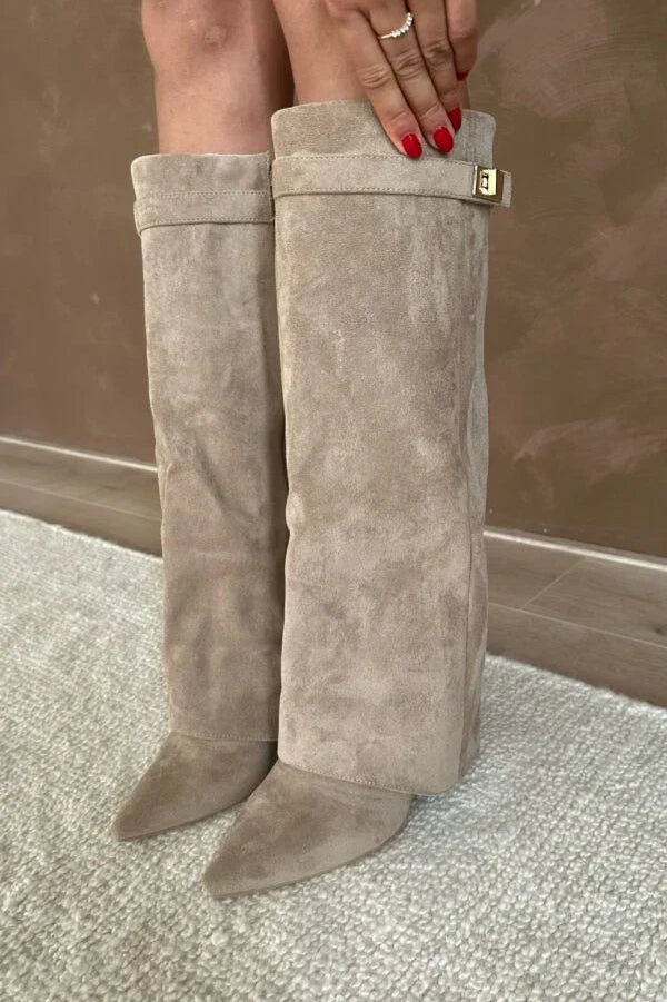 Women beige boots, close-up