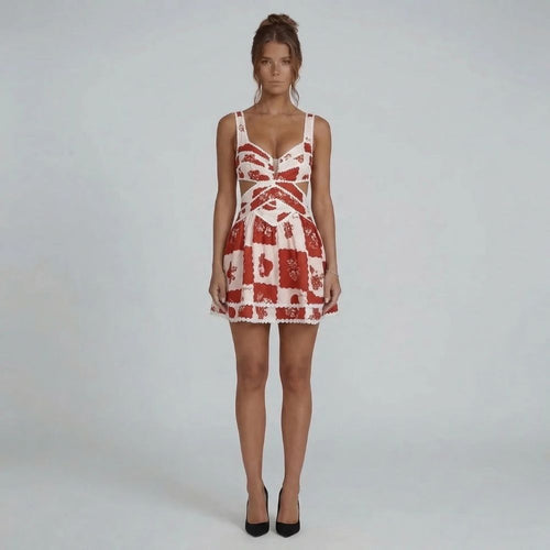 Red floral patchwork mini dress — front view showing waist cut-outs and structured V-neck