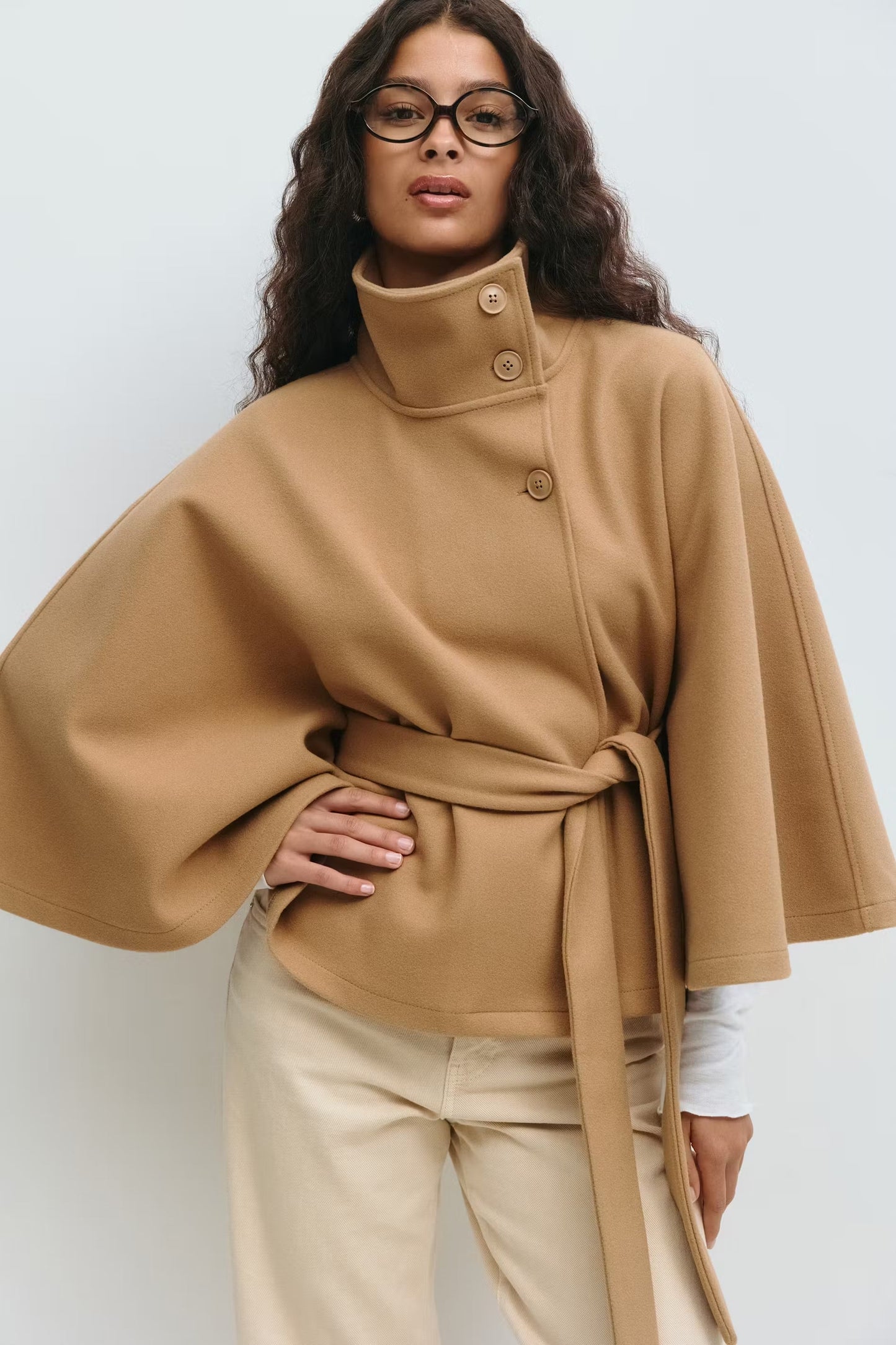 Women funnel neck draped coat, front view