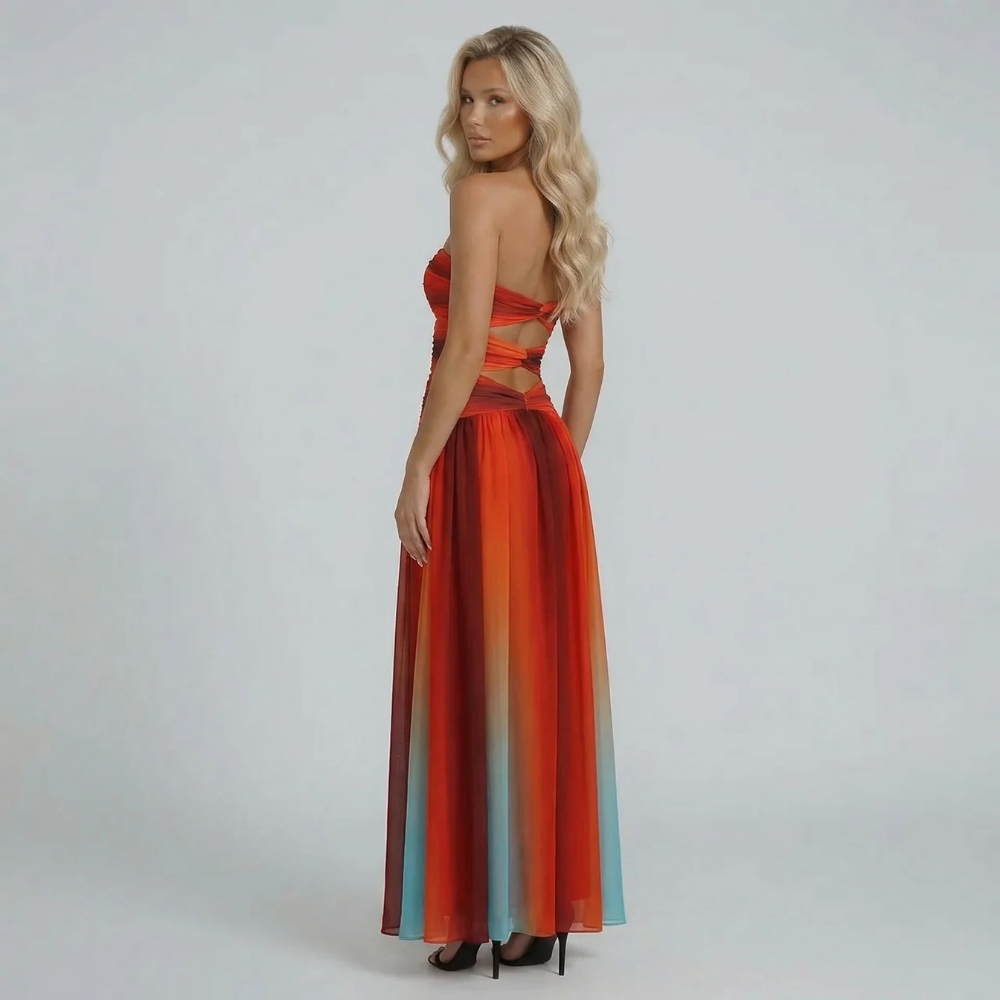 Strapless ombre cutout maxi dress — styled look showing movement and flattering waist detail.