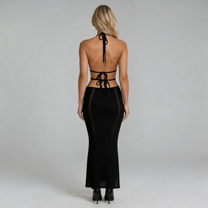 Black crochet cutout halter maxi dress — back view focusing on daring open-back tie design.