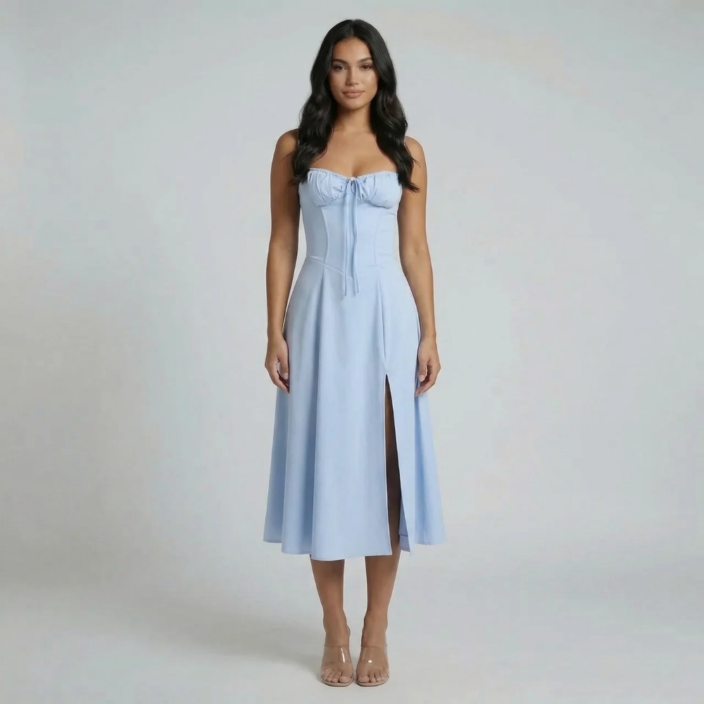 Baby blue A-line corset midi dress with sweetheart neckline and slit — styled with heels.