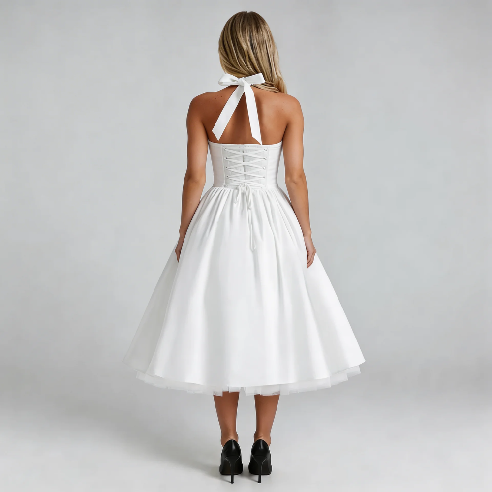 White corset halter midi dress with lace-up back — back view focusing on fit details.