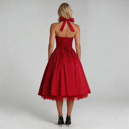 Red corset halter midi dress with lace-up back — back view highlighting adjustable tie closure.