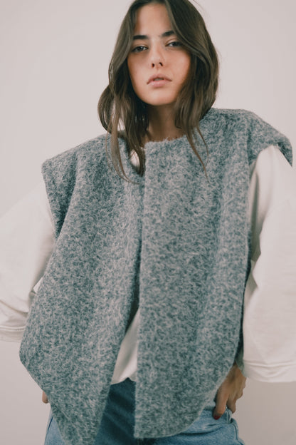 Women blue crew neck vest, close-up