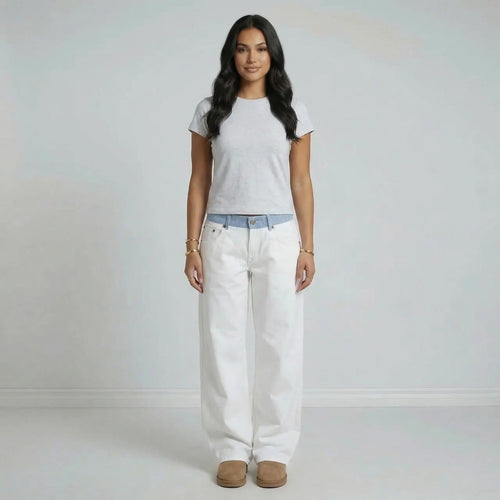 White wide-leg jeans with striped waistband — front view showing high-rise fit