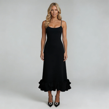 Black midi dress with spaghetti straps and ruffled hem – front view showcasing fitted bodice.