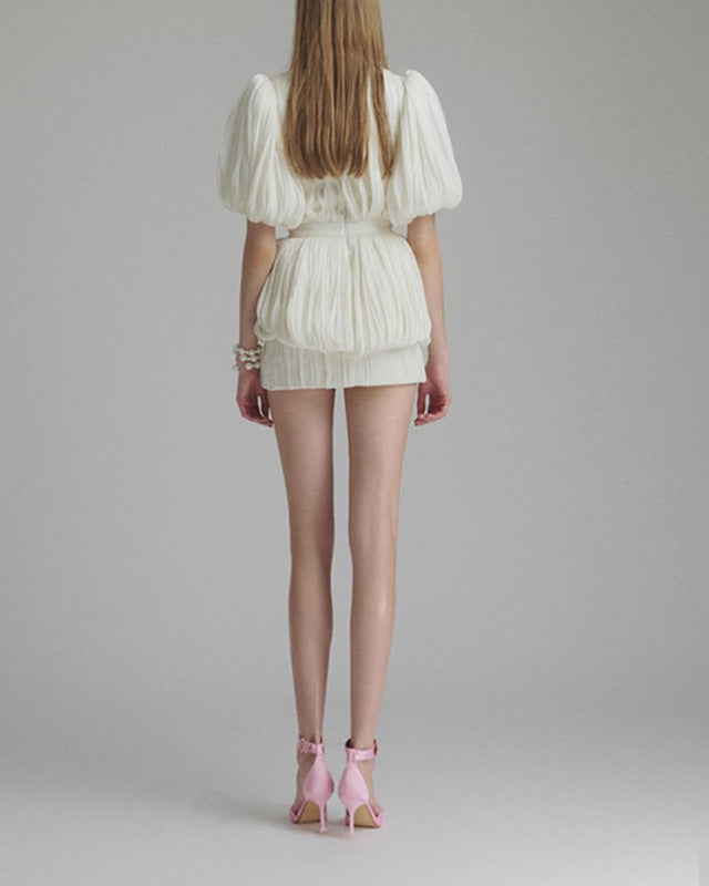 Kensley Pleated Mini Dress in Ivory